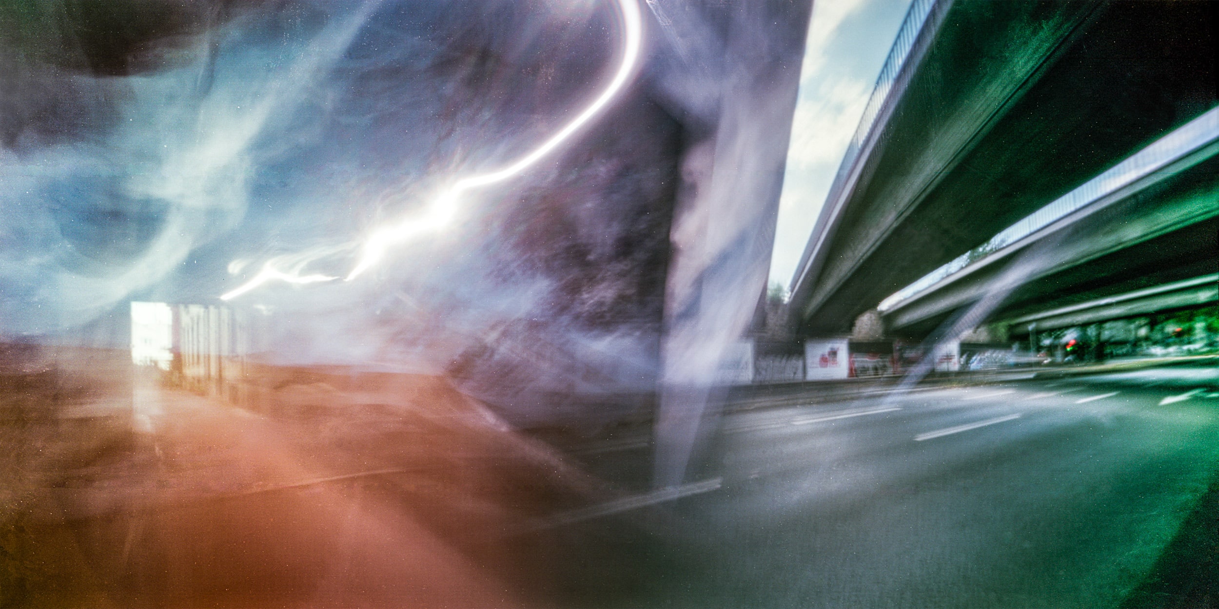 Pinhole photograph: green streaks of light across a long exposure