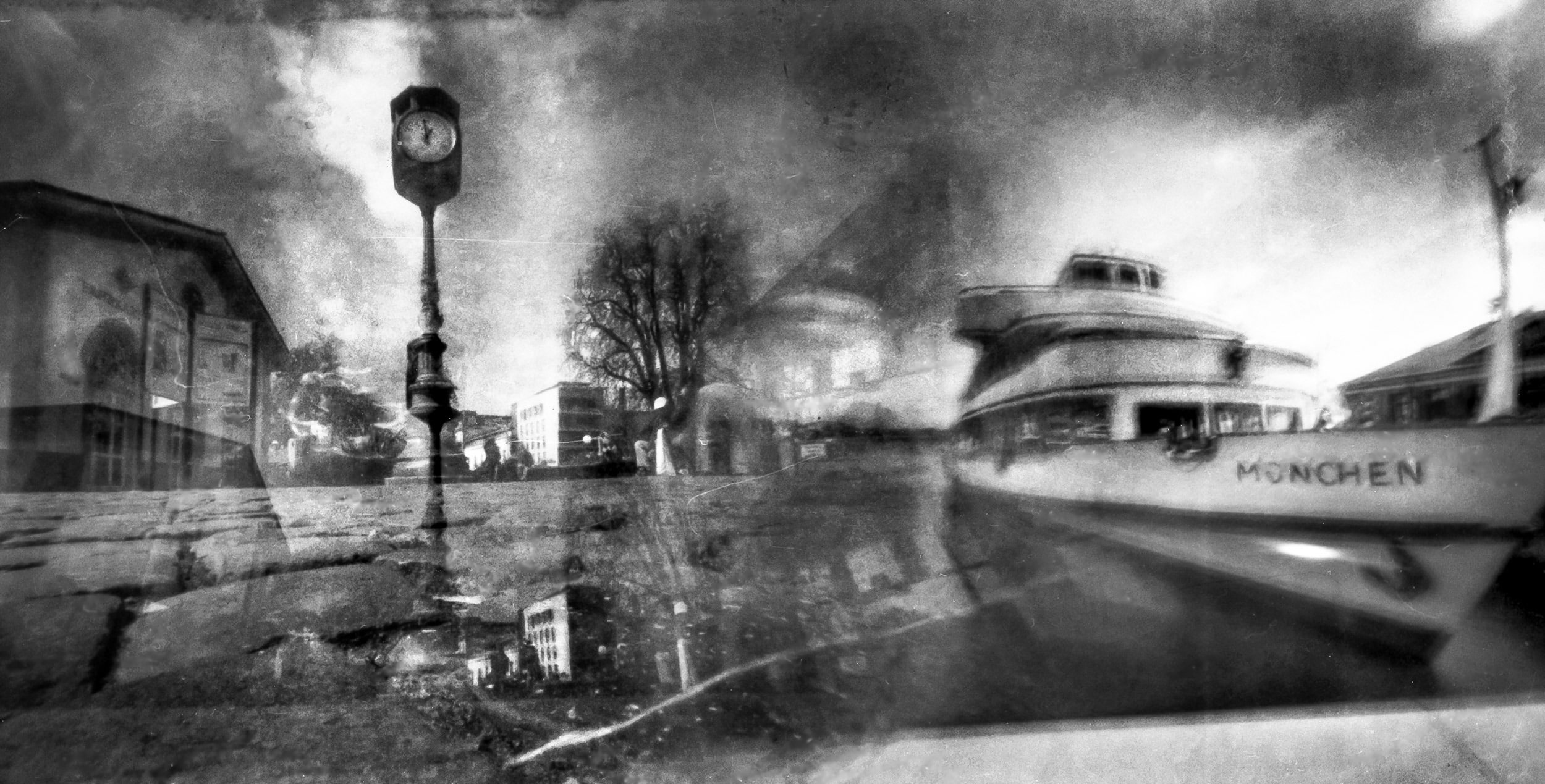 Pinhole photograph: a street at night, black and white