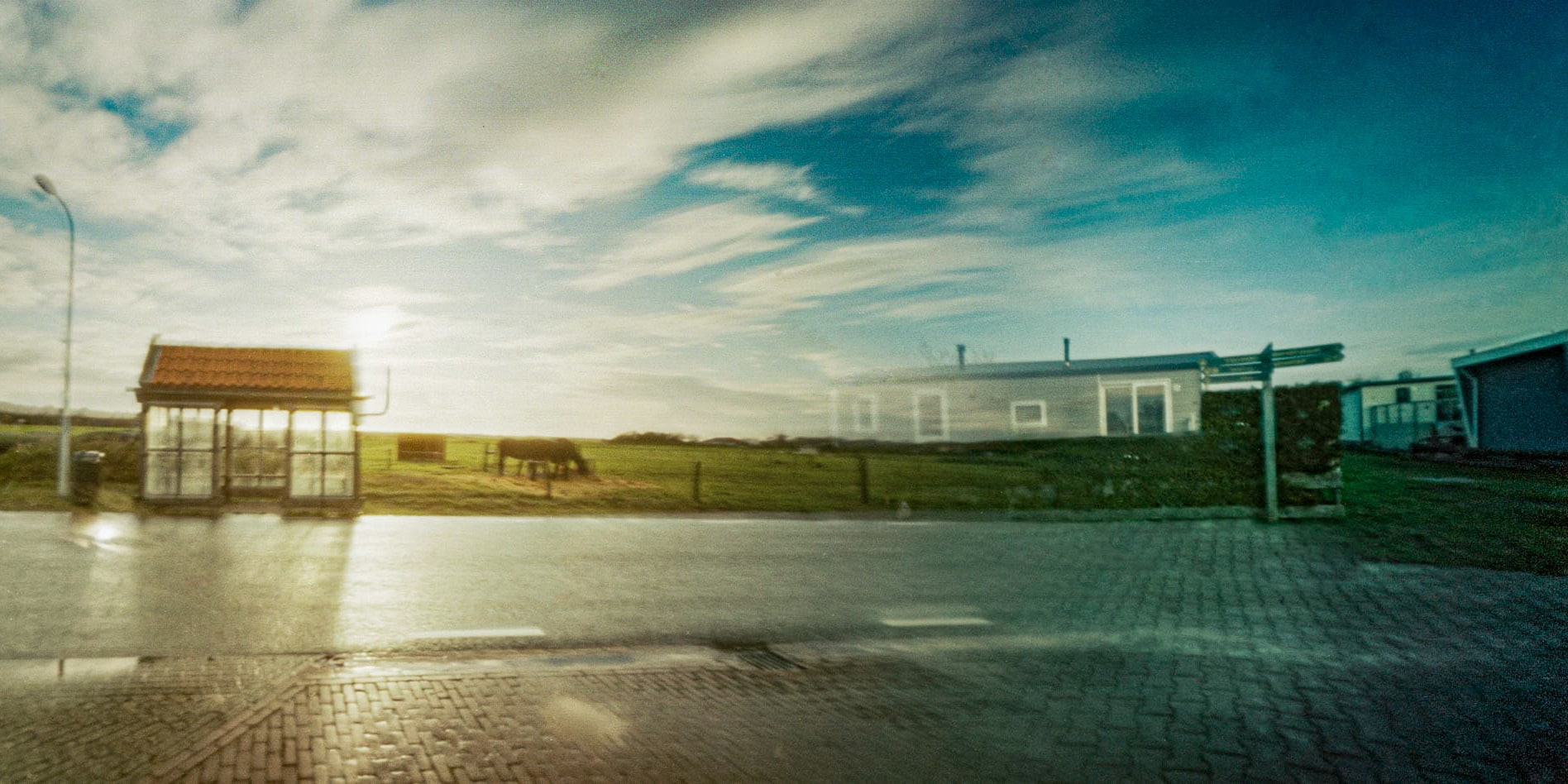 Pinhole photograph: flat land in evening light
