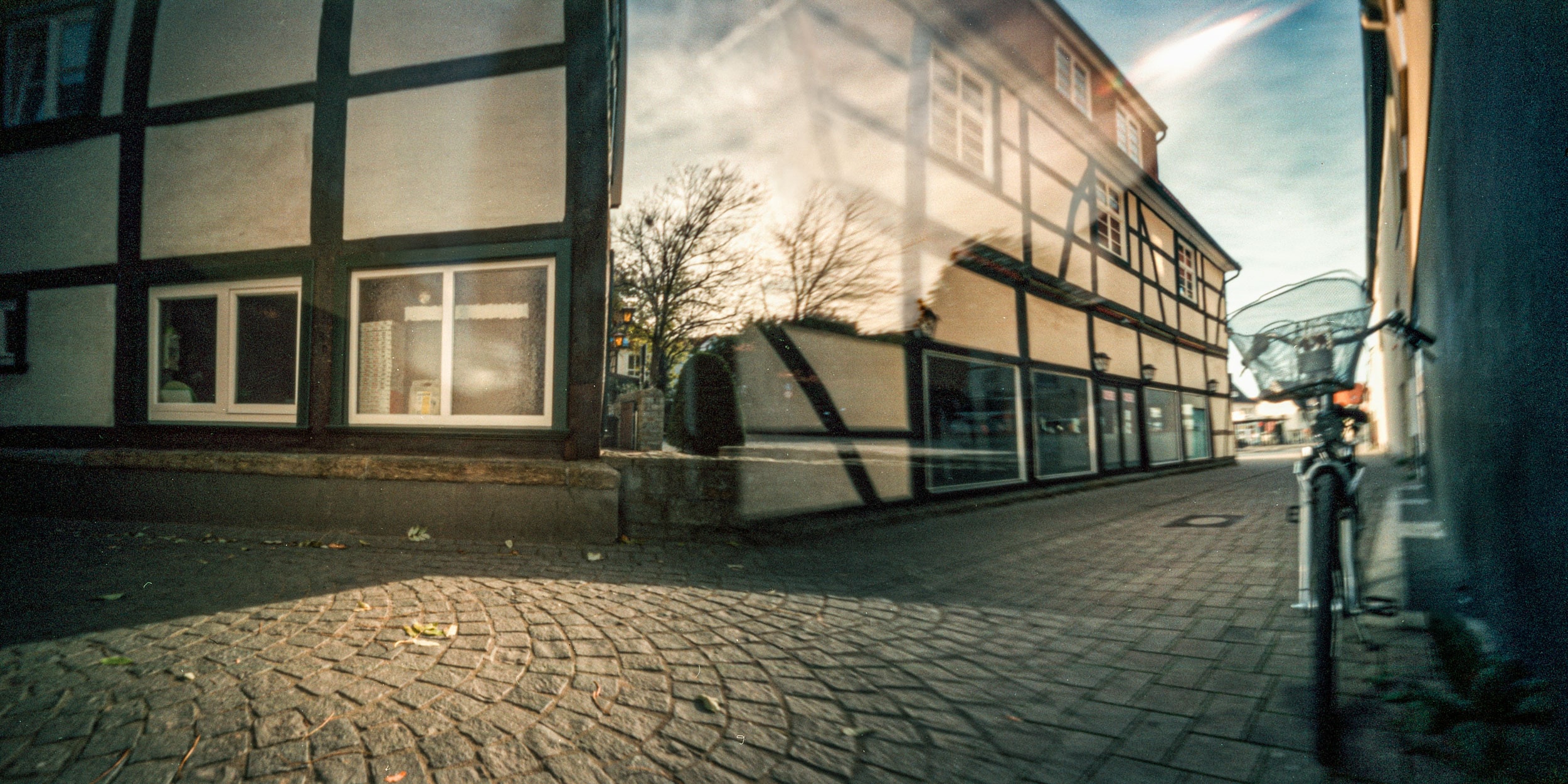 Pinhole photograph: a street of half-timbered houses